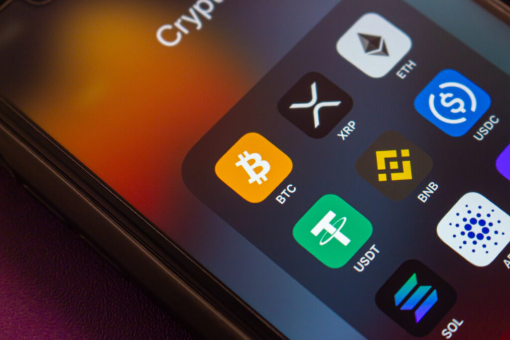 Mexico City MEXICO - Jan 7 2025 BTC Bitcoin and other cryptocurrency icons are displayed on an iPhone Popular crypto concept highlighting DeFi and the growing influence of digital currencies - Trade Info XRP ETF, BlackRock