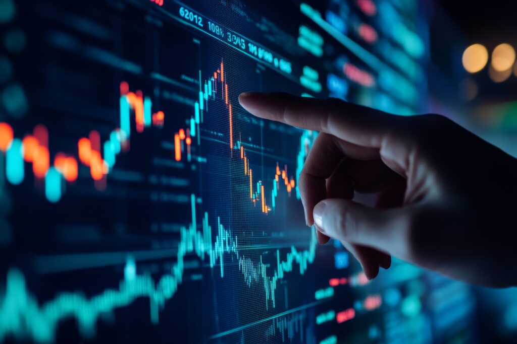 Hand analyzing stock market data on screen at night 1 - Trade Info analýza, Paul