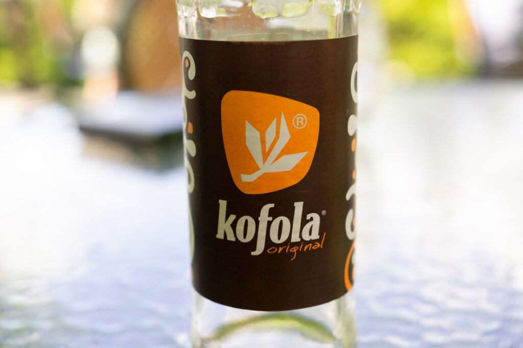 Moravka Czech Republic Czechia - June 6 2020 Kofola - Kofola - soft drink and beverage producer and maker Detail of label on the glass bottle Very shallow focus - Trade Info Kofola, Pražská burza