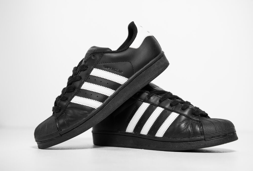footwear fashion adidas sport classic superstar shoe pair sneakers shoes lifestyle casual activity foot isolated training sneaker wear jogging style exercise running design trainers equipment stylish athletic outdoor sportswear original sole popular walk product photography trendy object fitness leather laces product trainer street shoelace retro vintage urban shell toe super star adidas superstar adidas shoes - Trade Info adidas