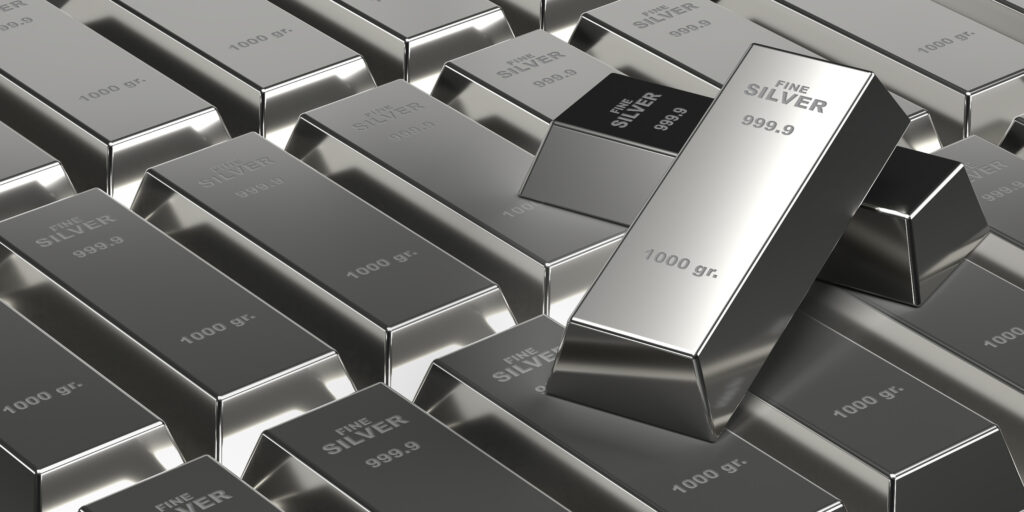 Investment banking business concept 3d rendering silver bars on brick wall background Two blocks on many shiny ingots Treasure blocks for wealth and investment Financial profit in stock markets - Trade Info Striebro, zlato