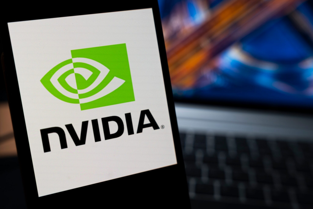 Tilted screen shows the NVIDIA logo: green square with a white eye-like emblem on white background.